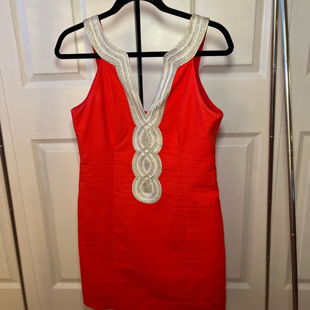Elegant Red Sleeveless Dress with Gold Detailing